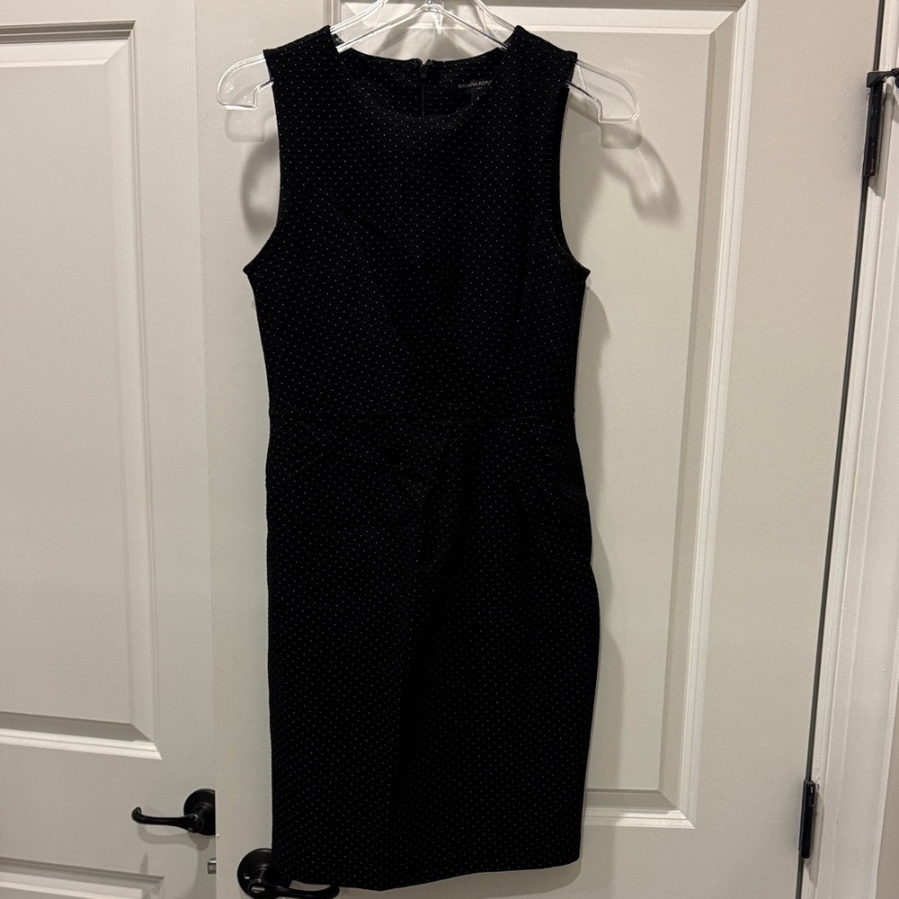 Elegant Black and White Polka Dot Sleeveless Dress